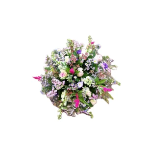 Rouwarrangement rond veldbloemen pastel